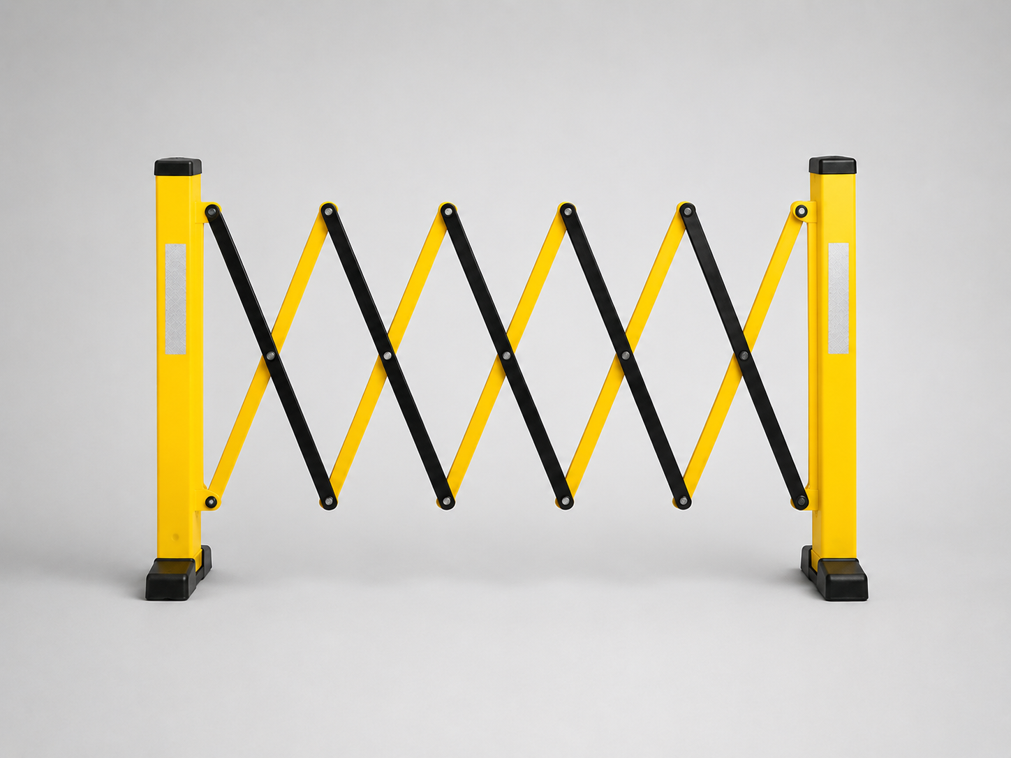 Yellow and black expandable safety barrier